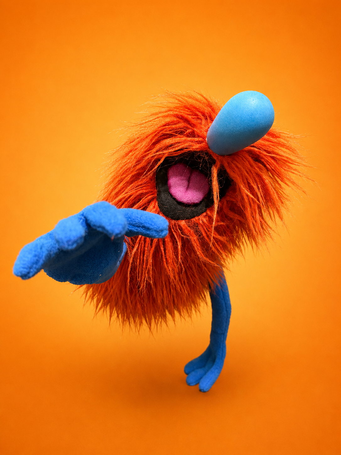 Orange Monster Rod puppet