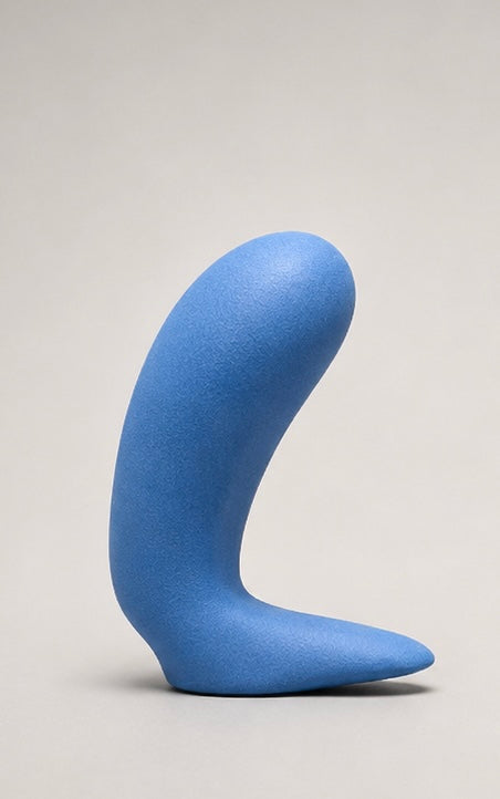 Blue curved foam puppet nose, right-side profile