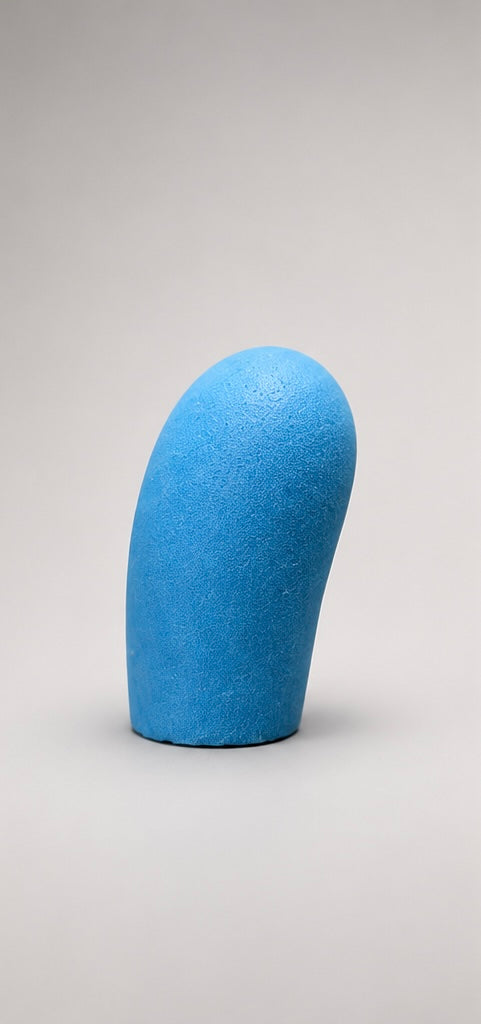 Blue upright curved foam puppet nose, angled side view